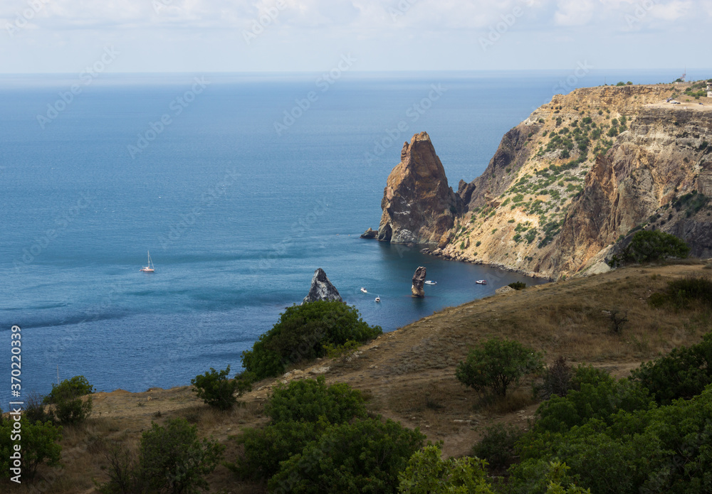 Cape Fiolent, Crimea, a view of the rocky mountains and the blue sea to the very horizon