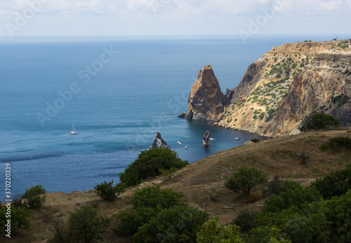 Cape Fiolent, Crimea, a view of the rocky mountains and the blue sea to the very horizon