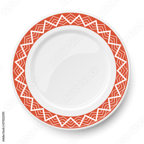 Red plate with white geometric pattern isolated on white background