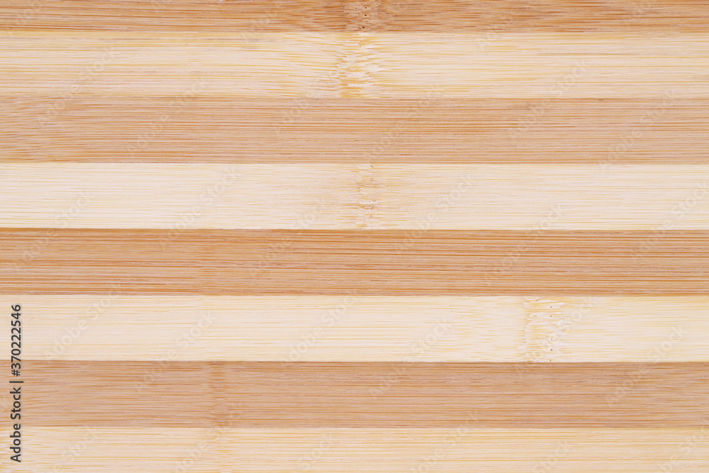 Fototapeta premium Abstract bamboo wooden texture background. Close up of cutting board