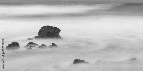 Coastal landscape with long exposure in the Canallave Beach.. Cantabria. Spain. photo