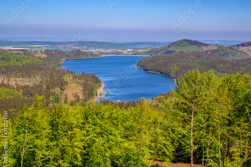view of Granestausee reservoir and forest at Harz Mountains National Park, Germany