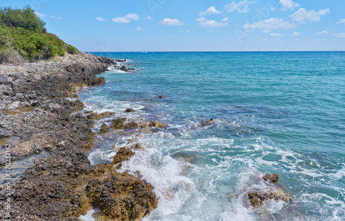 Fototapeta Naklejka Na Ścianę i Meble -  Beautiful summer day landscape on Greek island Crete - stone beach.