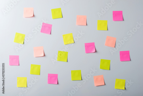 Sticky notes in random order on a whiteboard
