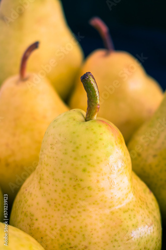 Pears group on black background photo