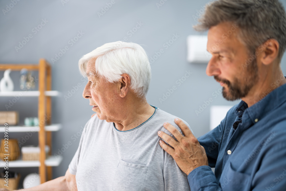 Old Senior Man With Dementia Getting Support And Care Old Senior Man With Dementia Getting Support And Care