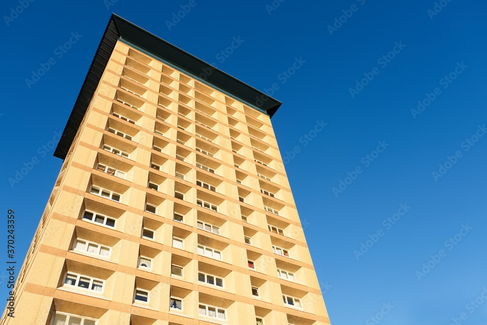 Tall high rise council flats against blue sky Tall high rise council flats against blue sky