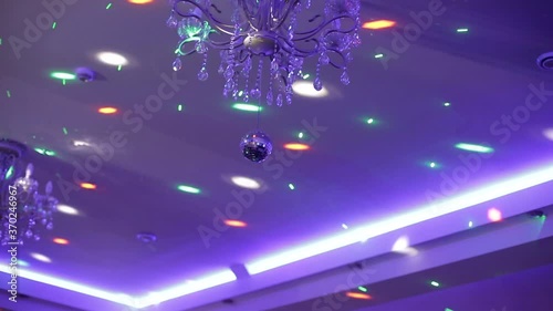 colorful lights on the ceiling during a party, color music photo