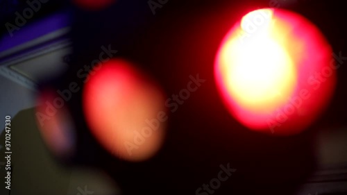 multi-colored lights during a party in blur, color music, defocus photo