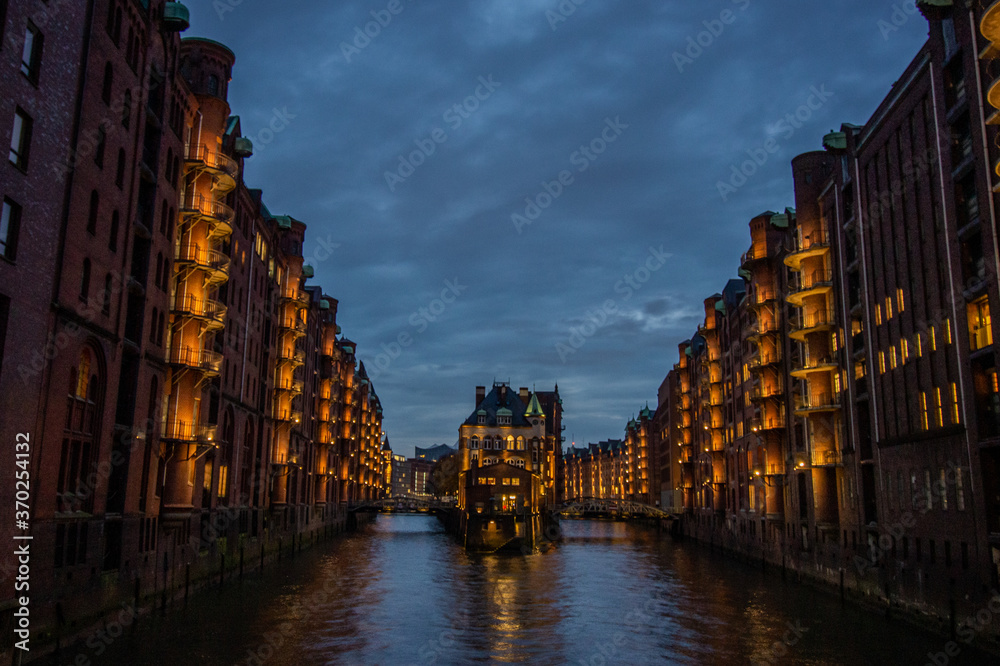 The Warehouse District (Speicherstadt) in Hamburg, Germany. View of Wandrahmsfleet. The largest warehouse district in the world is located in the port of Hamburg within the HafenCity quarter.