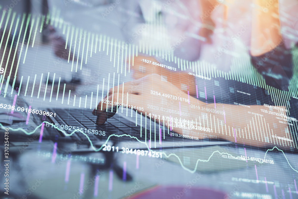 Multi exposure of woman hands typing on computer and financial graph hologram drawing. Stock market analysis concept. Multi exposure of woman hands typing on computer and financial graph hologram drawing. Stock market analysis concept.