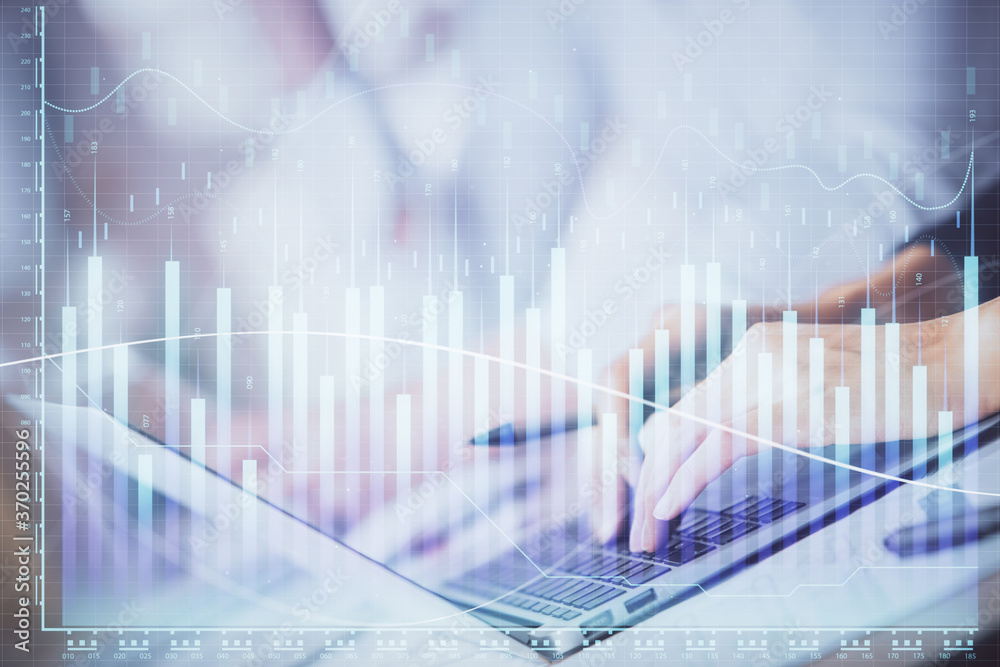 Double exposure of woman hands typing on computer and forex chart hologram drawing. Stock market invest concept. Double exposure of woman hands typing on computer and forex chart hologram drawing. Stock market invest concept.