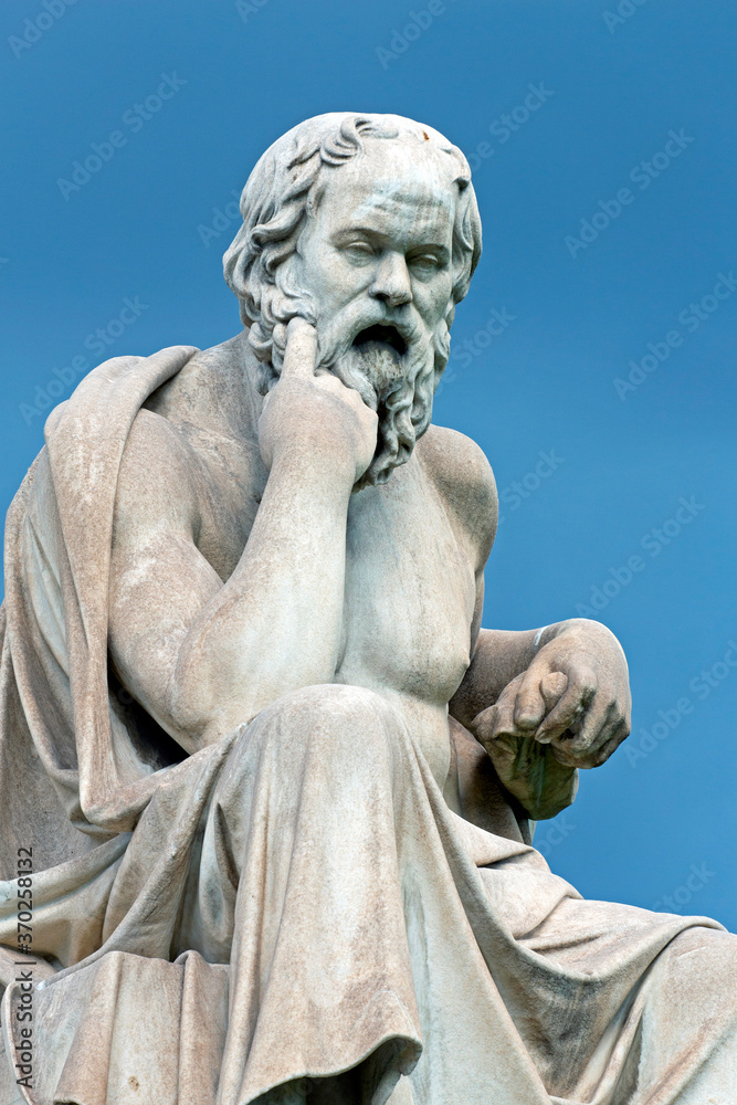 Close up of the marble statue of the ancient Greek philosopher Socrates   in front of National Academy of Athens / Greece