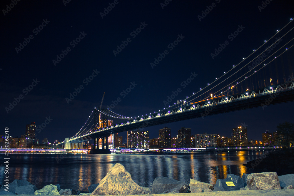 Fototapeta premium Manhattan Bridge from Brooklyn with construction going on the back.