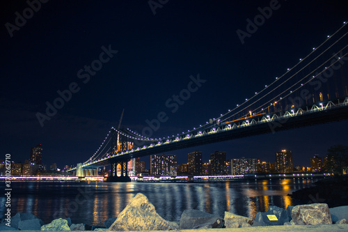 Manhattan Bridge from Brooklyn with construction going on the back.