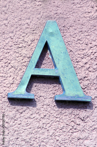 Found letters as in A through Z, these are old, worn, faded, used, abused, unique, 3d  in effect, convey that idea or message in a way which attracts attention, photo