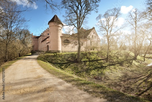 Low angle panoramic view of the Edole castle in Courland (Kurzeme), western Latvia. History, architecture, travel destinations, national landmark, sightseeing theme photo