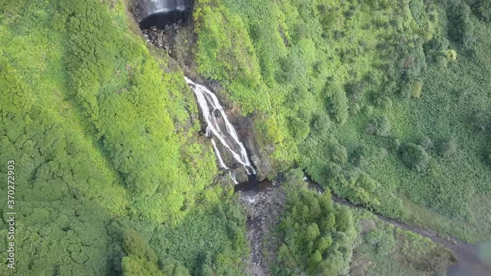 Aerial Tilt Shot Of Beautiful Waterfalls Flores Poco Riberia Do Ferreiro, Azores