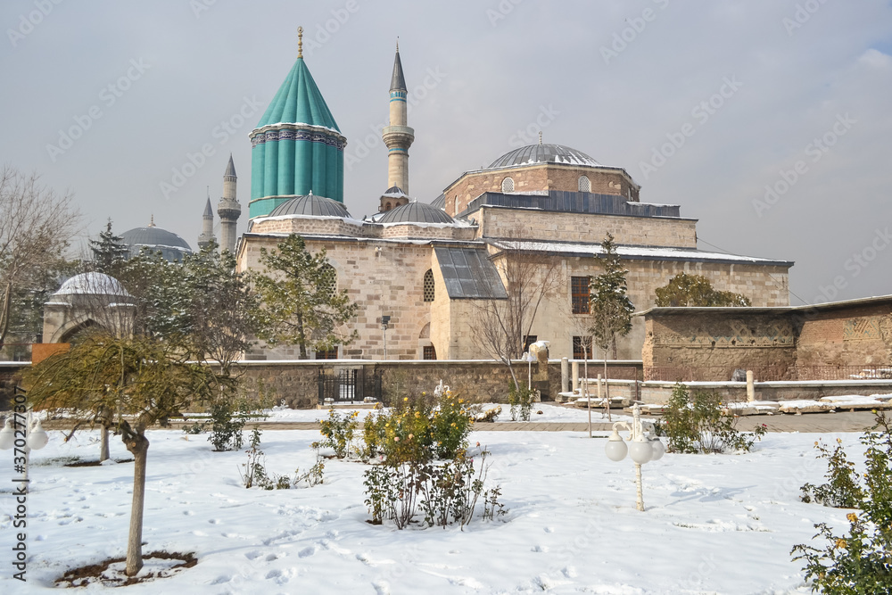 Mevlana Museum during winter with park full of snow