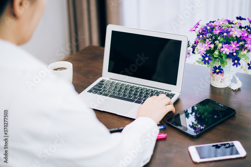 Women who work at home with laptops