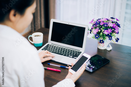 Women who work at home with laptops