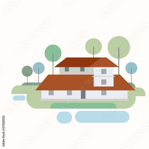 Kerala style traditional house surrounded by trees