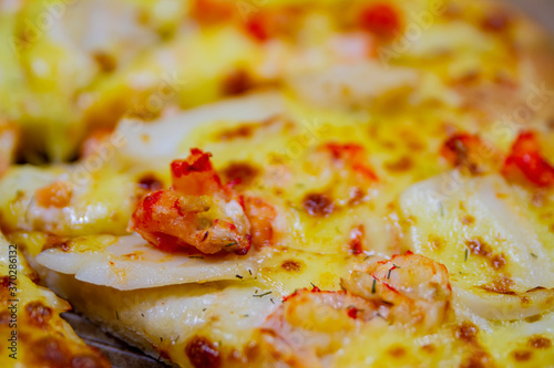 Close up shot of a delicious shrimp pizza