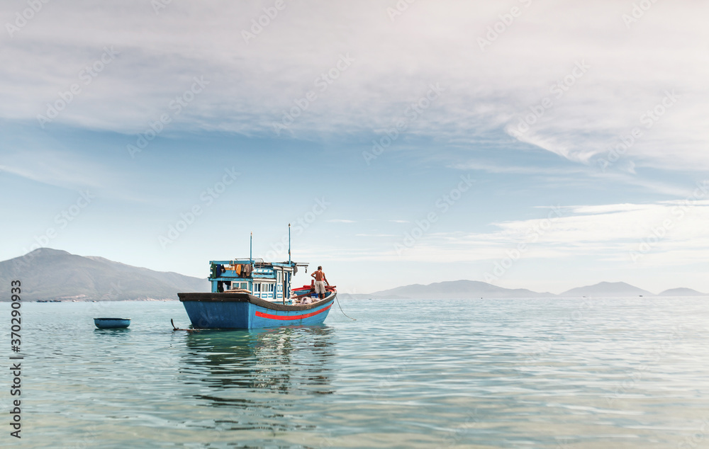 Fisherman's boat at sea at dawn. Fisherman's boat at sea at dawn.