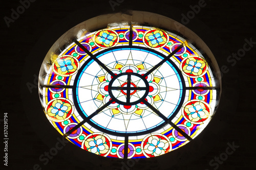  The polychrome glass rose window of the Church of Santa Maria di Ronzano  in Abruzzo  in the province of Teramo.