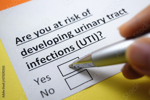 Photography A person is answering question about urinary tract infection.