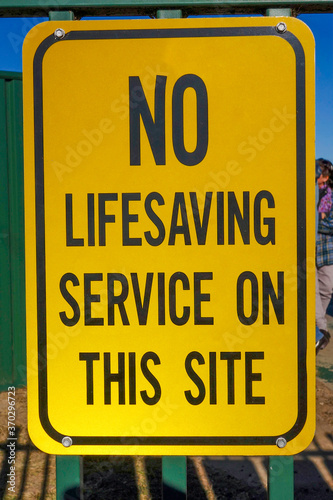 Warning: no lifesaving service on this site, Australia