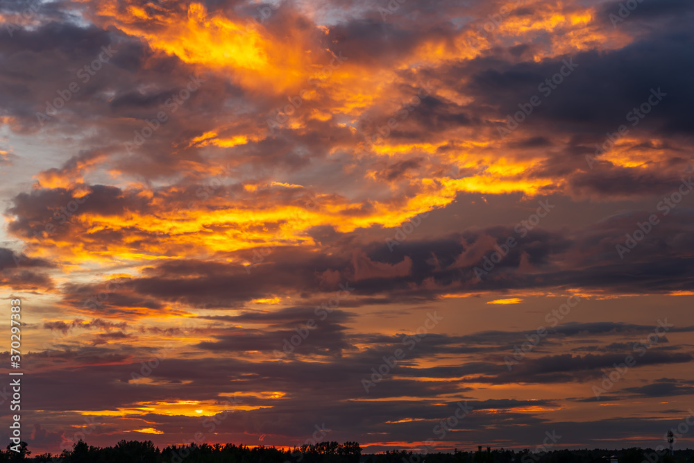 Yellows, oranges, and browns of the evening sky Yellows, oranges, and browns of the evening sky