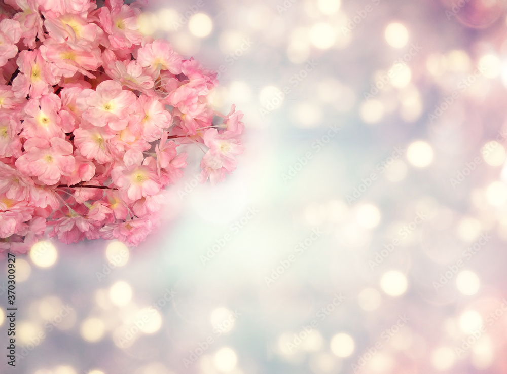 spring background flowering white sakura cherry flowers tree and abstract bokeh