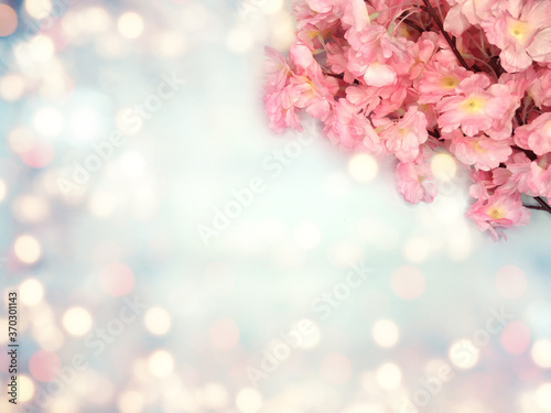spring background flowering white sakura cherry flowers tree and abstract bokeh