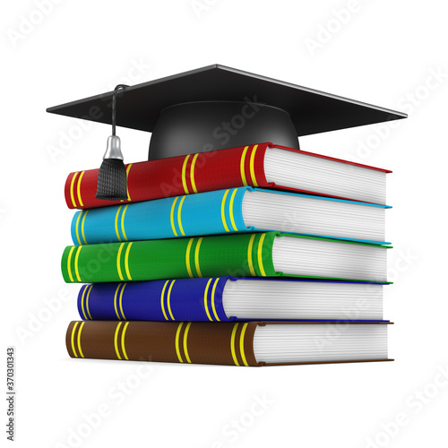 graduation cap and book on ...