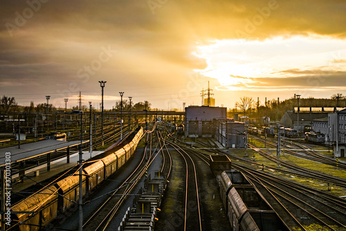 bright cloudy sunset over old train station Ostrava railroad