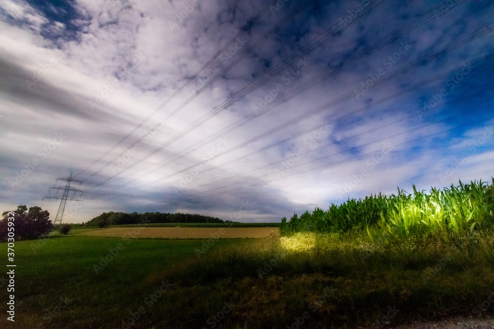 green field and blue sky