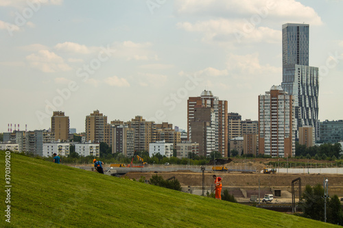view of modern residential buildings against a cloudy sky and space for copying in Moscow Russia © Inna