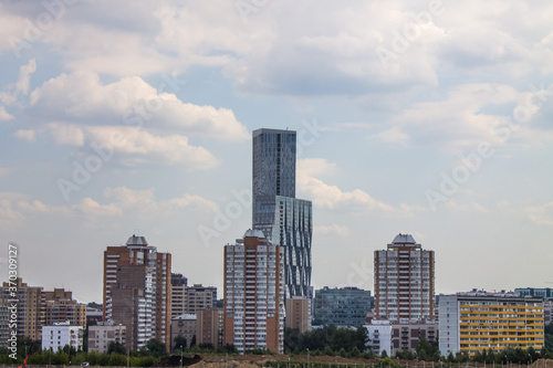view of modern residential buildings against a cloudy sky and space for copying in Moscow Russia © Inna