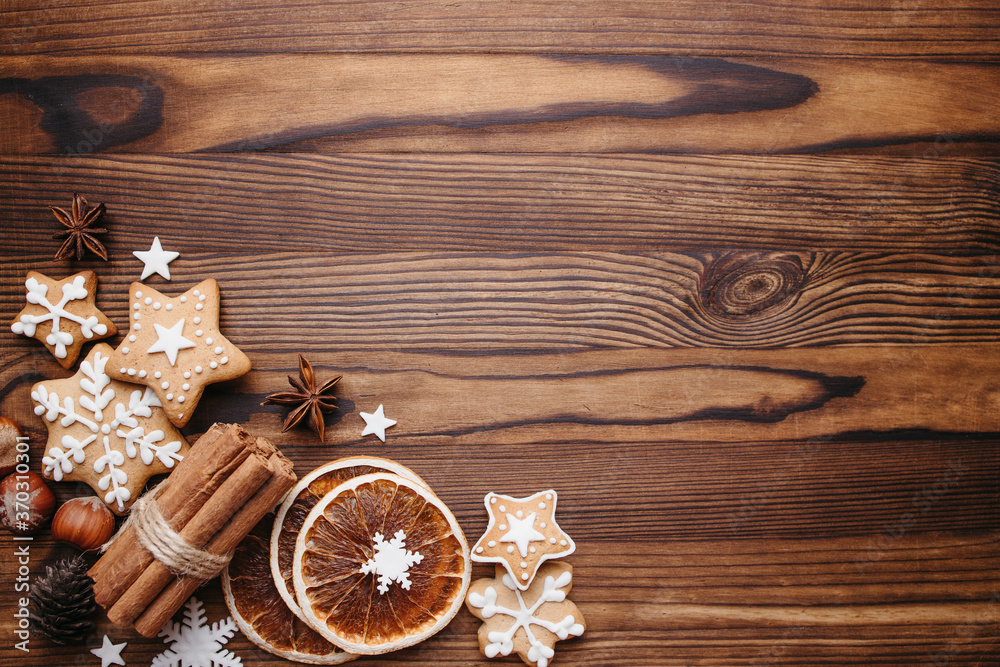 Winter holidays celebration atmosphere, Christmas and New Year design template. Composition with festive embellishments, homemade gingerbread cookies and decorations Winter holidays celebration atmosphere, Christmas and New Year design template. Composition with festive embellishments, homemade gingerbread cookies and decorations