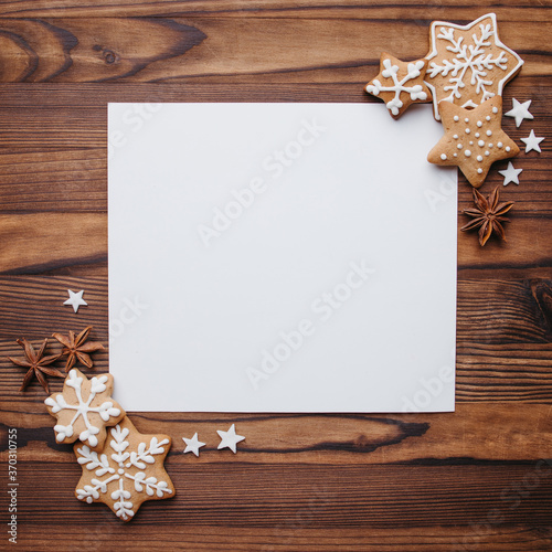 Christmas and New Year background. Composition of festive sweets and decorations with copy space. Winter holidays greeting card mockup