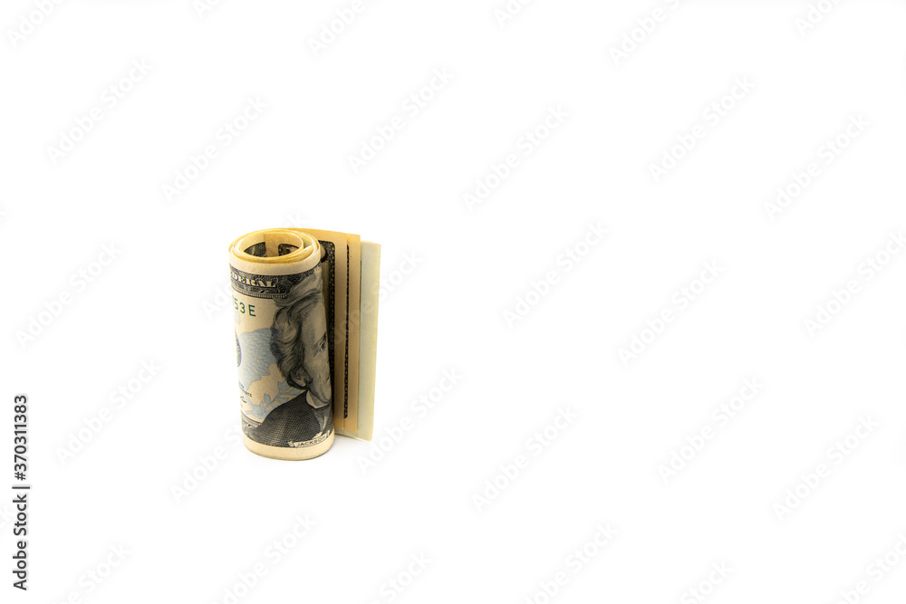Stack of US dollars isolated over white background with copy space, cash is king concept image Stack of US dollars isolated over white background with copy space, cash is king concept image