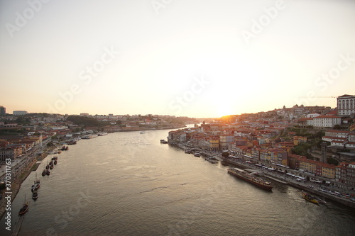 Magnificent sunset over the Porto city center and the Douro river © Hirotsugu