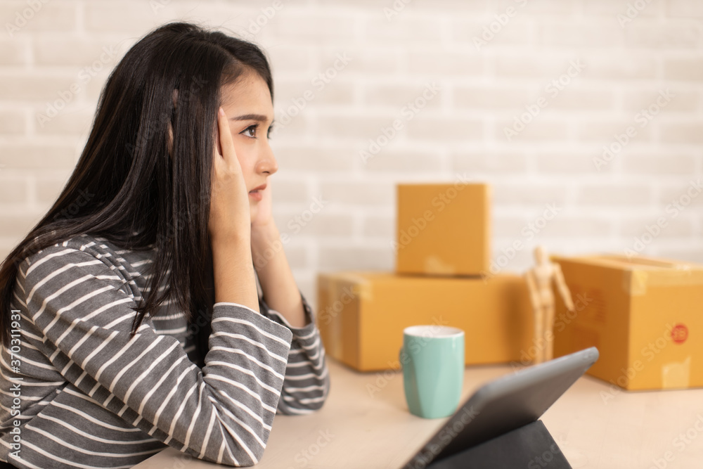Online Video Call Conference of Work Team from Home Office.Smiling young asian woman sit at home speaking.online with internet teacher learn language talk .young woman have problem and stress. Online Video Call Conference of Work Team from Home Office.Smiling young asian woman sit at home speaking.online with internet teacher learn language talk .young woman have problem and stress.