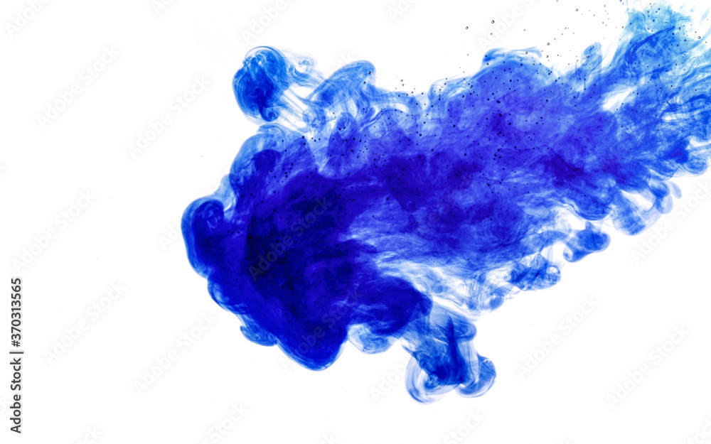 Blue ink injected into water from syringe, colour mixing with water creating abstract shapes