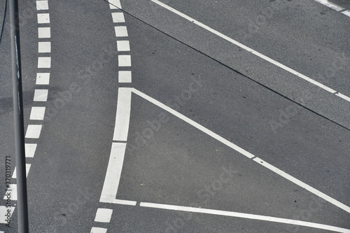 street crossroads with lines and signs stripes for bike from above