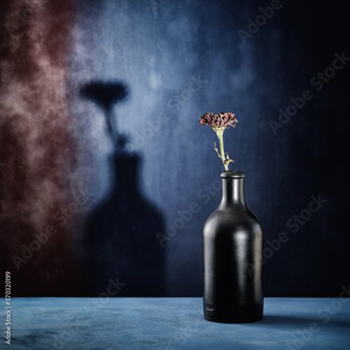 bottle of wine on a wooden background