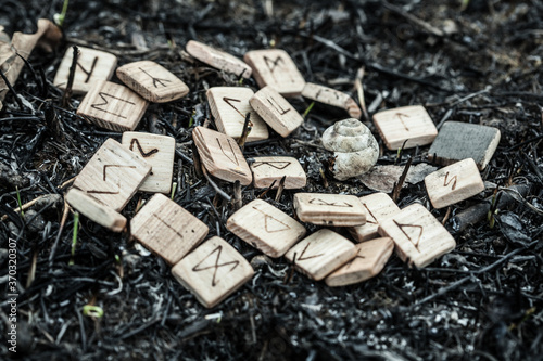 wooden runes on the ground photo