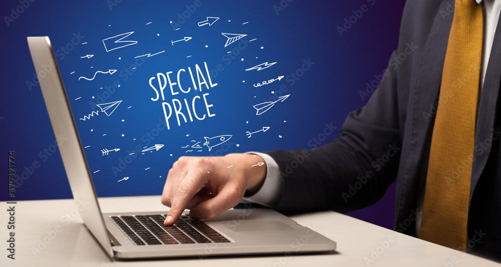 Businessman working on laptop with SPECIAL PRICE inscription, online shopping concept Businessman working on laptop with SPECIAL PRICE inscription, online shopping concept