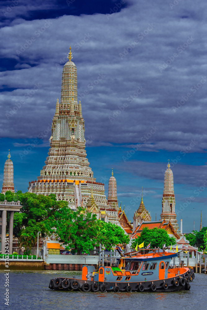 Fototapeta premium background of important religious attractions in Bangkok (Wat Phra Chetuphon (Wat Pho - reclining Buddha), a large pagoda and beautiful sculptural art give future generations to explore its history